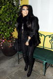 th_74813_celebrity-paradise.com-The_Elder-Kim_Kardashian_2010-01-27_-_leaves_Dan_Tanas_767_122_411lo.jpg