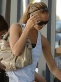 Jessica Alba tries to cover up in West Hollywood, Ca